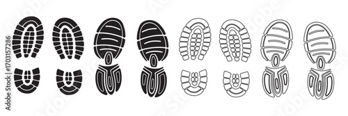 Collection of Black Footprints and Shoe Prints on White Background