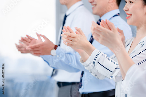 business team showing thumbs up