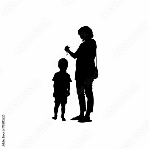 Silhouette of mother checking child s temperature with thermometer