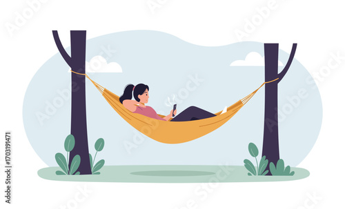 Two young women relax in a hammock outdoors, enjoying a peaceful afternoon using their smartphones and headphones, surrounded by nature's tranquility.