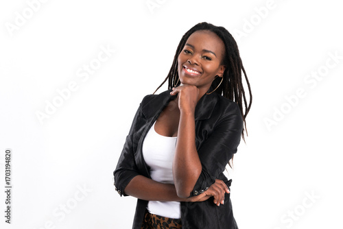 Beautiful cheerful black woman with dreadlock and warm smile wearing black blazer posing confidently at studio shot isolated on white background.