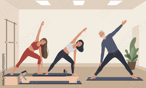 Three people, a young woman, a middle aged woman and an older man, perform yoga and pilates exercises with equipment in a light-filled studio.