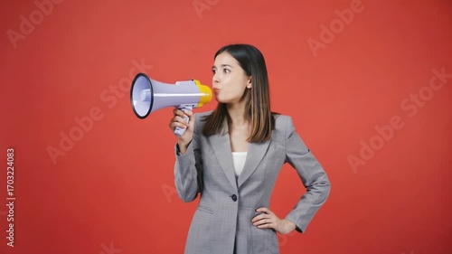 Woman Communicating with Megaphone: A woman in a stylish business suit actively conveys her message. A bold red backdrop contrasts the vibrant scene.
