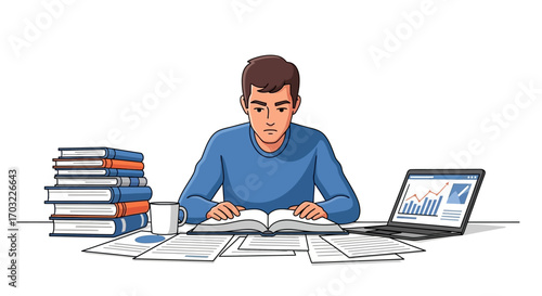 Young male student studying at a desk with books and laptop.