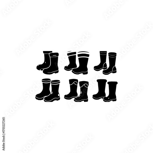 A black and white silhouette of a boot set