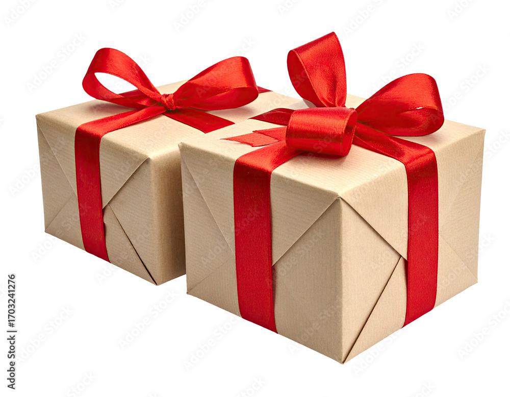 Obraz premium Two light beige gift boxes, tied with red ribbon bows, sit side-by-side
