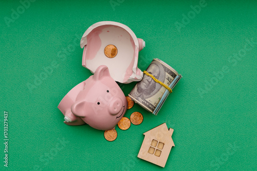 Glass jar, piggy bank and model of house. Top view. Savings or mortgage concept