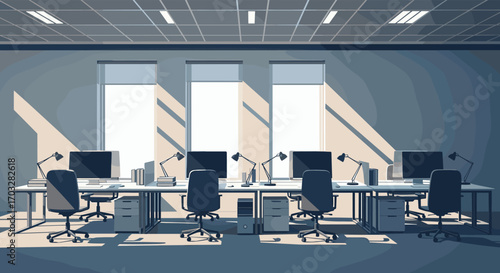 Modern office interior with rows of desks and computers under natural light