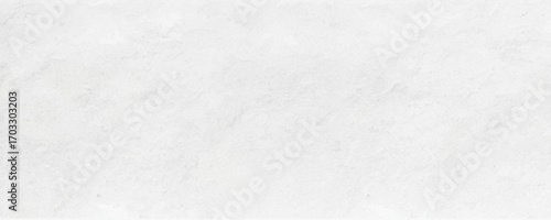 White rustic texture. Retro whitewashed surface of the old wall. Ancient structures. Grungy worn uneven painted plaster. Whiten the facade background