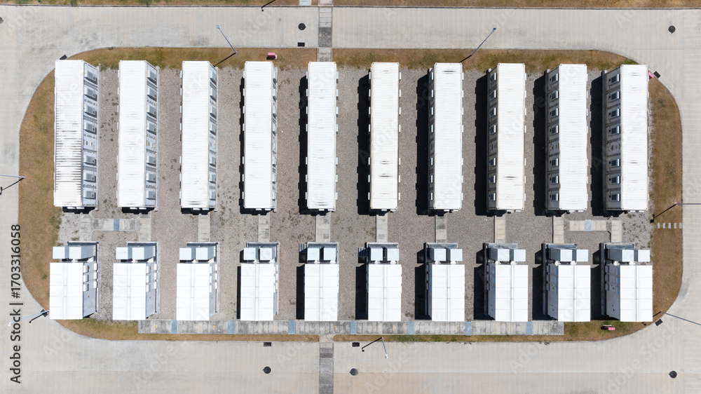 custom made wallpaper toronto digitalAerial view of battery energy storage systems under a clear blue sky