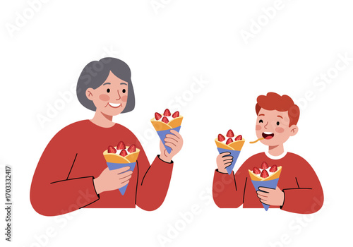 Woman and boy enjoying strawberry crepes together, perfect for food blogs, family cooking websites, mothers day promotions, and print ads.