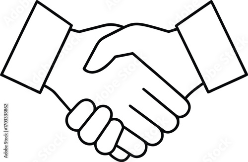 Two people of diverse gender and business background shake hands, a symbol of partnership and agreement