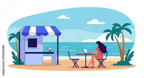 A woman works on her laptop at a table on the beach near a kiosk, with palm trees and the ocean in the background.