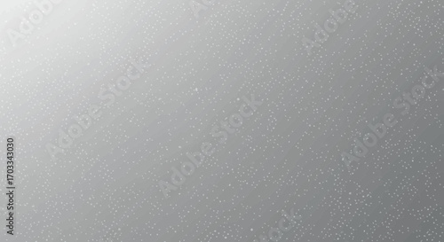 Subtle silver gradient background with scattered specks and light effect
