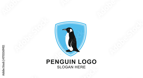 A penguin stands inside a light blue shield, centered above the text "PENGUIN LOGO" and "SLOGAN HERE".