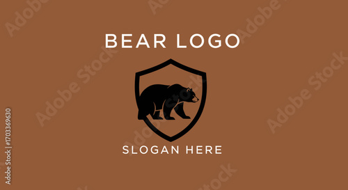 A stylized logo featuring a black bear silhouette inside a shield, with text above and below.
