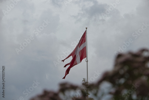 Danish flag on a cloudy day