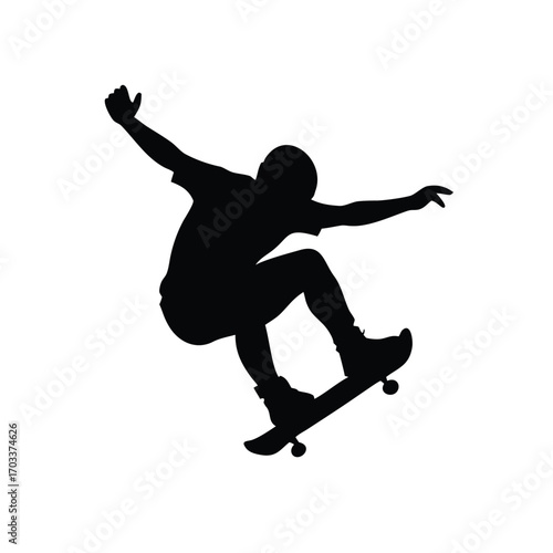 Skateboarder Silhouette Performing Mid-Air Trick