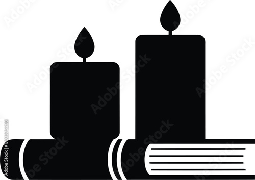 Two lit candles resting on a book, isolated on transparent background
