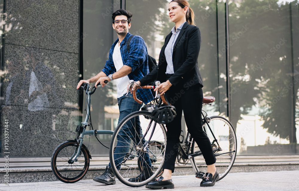 Obraz premium Commuting to work with bicycle. Businessman businesswoman cycling to office in downtown district. Modern diverse people use eco transportation on city street. Environmental pollution, climate change.
