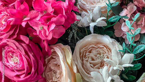 Fotografie Artificial Pink And Cream Roses And Mixed Fabric Flowers With Green Leaves, Idea