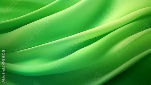 Green abstract silk background with smooth flowing texture and soft wave design