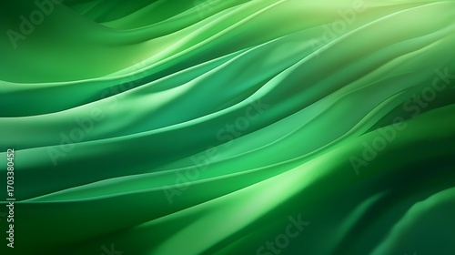Green abstract silk background with smooth flowing texture and soft wave design