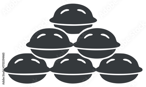 Simple black and white icon of whole walnuts stacked in a neat pyramid pile