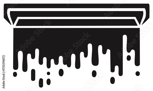 Black liquid dripping from a squeegee or scraper creating a messy abstract pattern