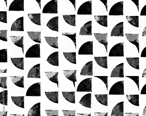 Abstract geometric pattern with textured quarter circles in black and white