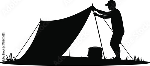 Person setting up tent outdoors silhouette camping