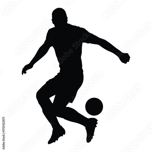 Silhouette of a soccer player in action kicking a ball on a white background