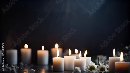 Multiple lit candles represent the concept of remembrance and are used to commemorate scenes.
