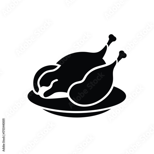 Silhouette of a roasted chicken on a platter