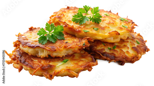 Stack of potato latkes isolated on transparent background with parsley garnish