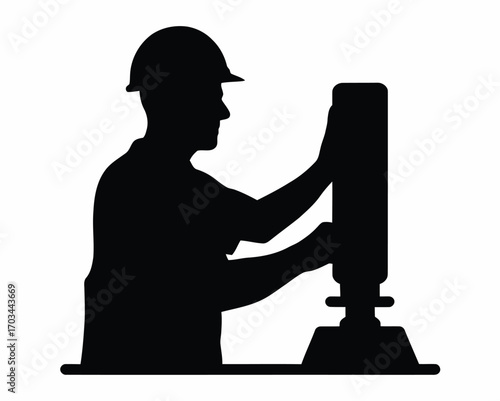 Silhouette of Construction Worker Operating Machine – Industrial Work and Manufacturing