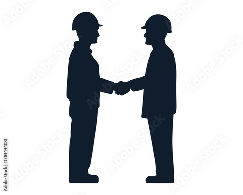 Silhouette of Construction Workers Shaking Hands – Industrial Teamwork and Partnership