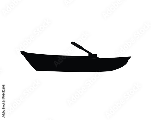 Silhouette of a small wooden rowboat with an oar in the water