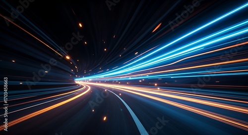 Dynamic neon light trails in blue and orange creating a sense of speed and motion on a dark road. Futuristic abstract background design concept for technology, energy, and fast movement.