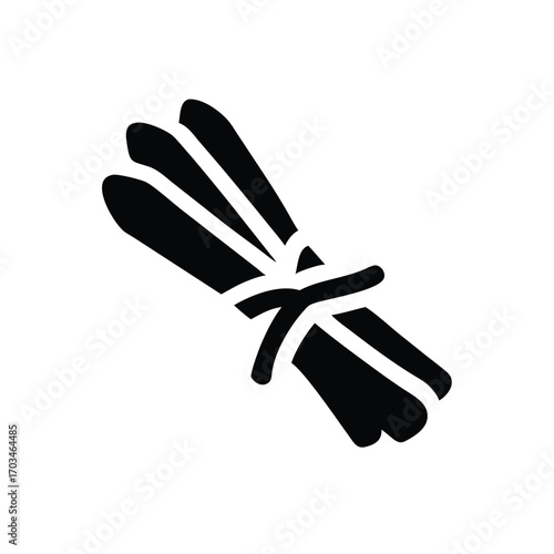 Bundle of tied cinnamon sticks silhouette icon