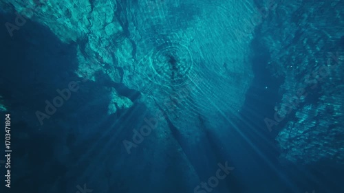 Underwater view of the karst lake with crystal clear blue water. Lake named Goluboye Ozero near the city of Samara in Russia