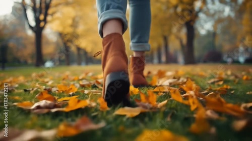 A Serene Walk Through a Golden Autumn Park, Feet Crunching on Fallen Leaves at Sunset.