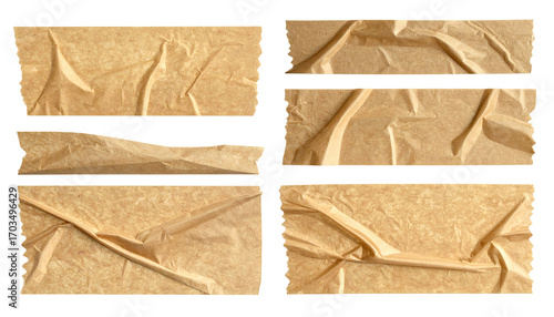 Close-up view of six sections of crumpled, light brown craft paper.  The paper exhibits various degrees of crinkling and creases, suggesting it was wrapped or folded. 