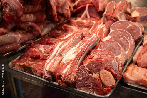 Mexico City, Mexico; November 1, 2025: Stalls selling fresh meat at the Mercado de la Merced market in Mexico City.