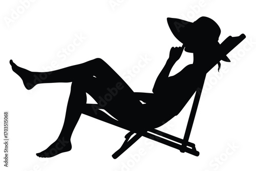 Silhouetted woman in hat relaxes on beach chair with finger to her lips