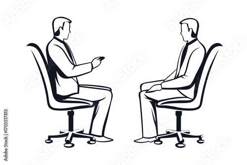 Two black and white businessmen are sitting on chairs facing each other in conversation