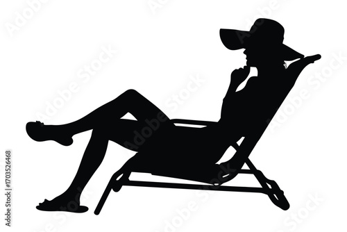 Black silhouette shows woman relaxing on a beach chair while thoughtfully touching her chin