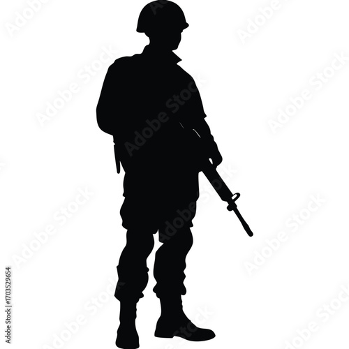 Silhouette shows soldier standing guard holding his rifle, embodying strength and military presence