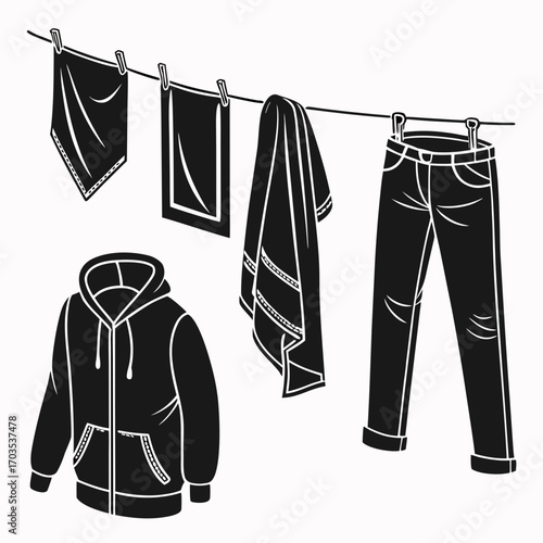A black and white illustration of a hooded sweatshirt a bandana a towel and a pair of jeans hanging on a clothesline with clothespins against a white background