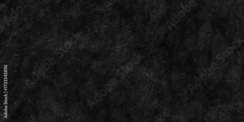 Dark charcoal grunge wall texture background. Dark black rough grunge surface with smoke edge. Black texture chalk board and black board. 